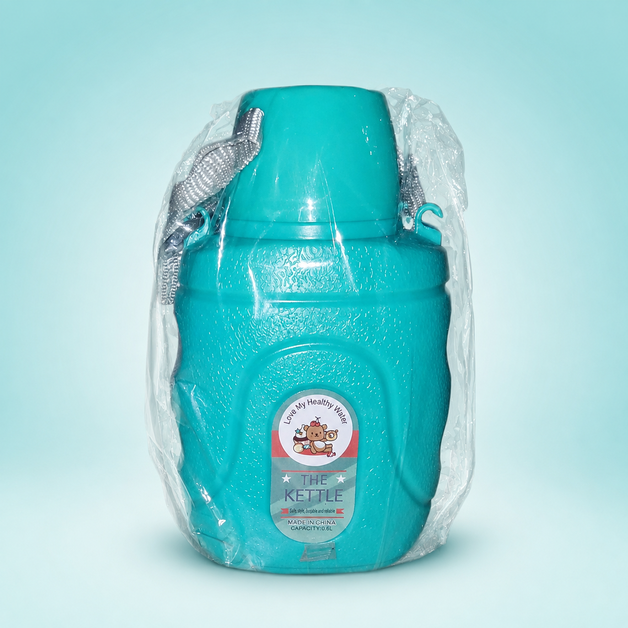 Gourde THE KETTLE 600 ml avec bandoulière